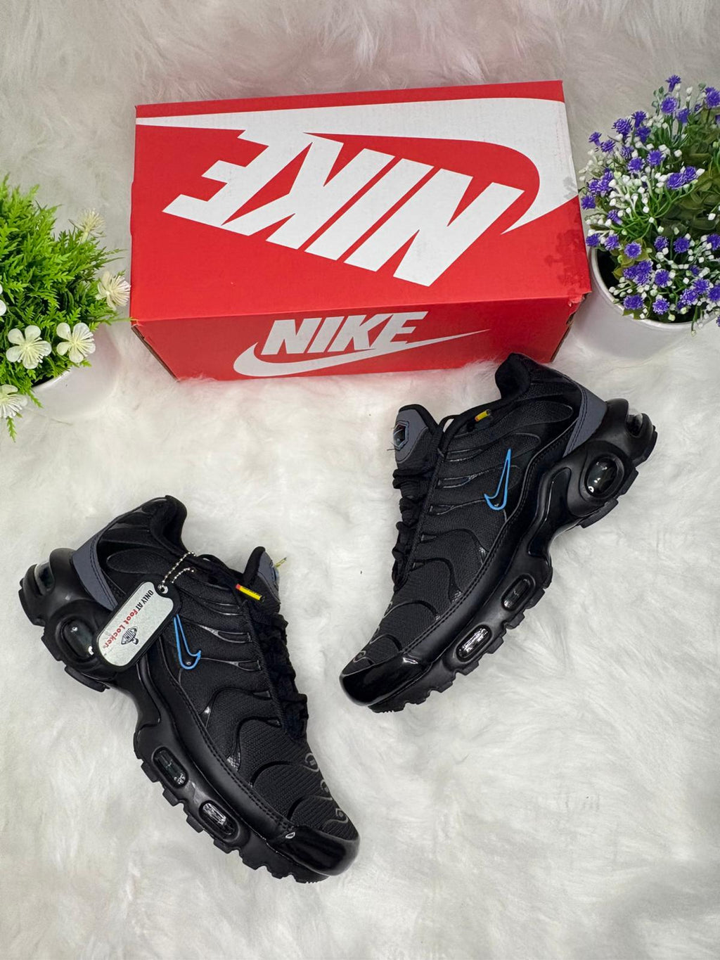 Nike Air Max Plus Black: Classic TN Sneakers with Tuned Air Comfort