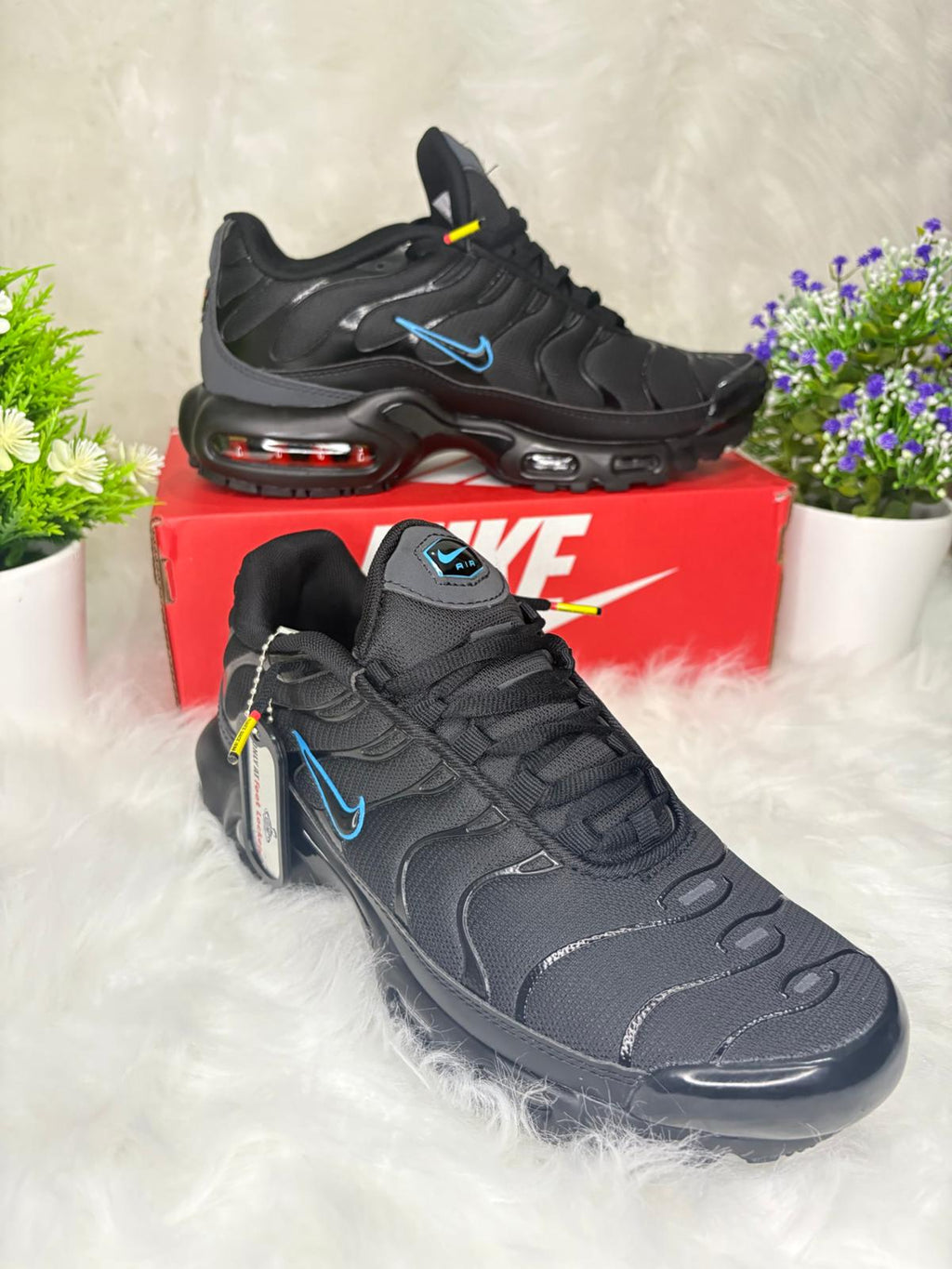 Nike Air Max Plus Black: Classic TN Sneakers with Tuned Air Comfort