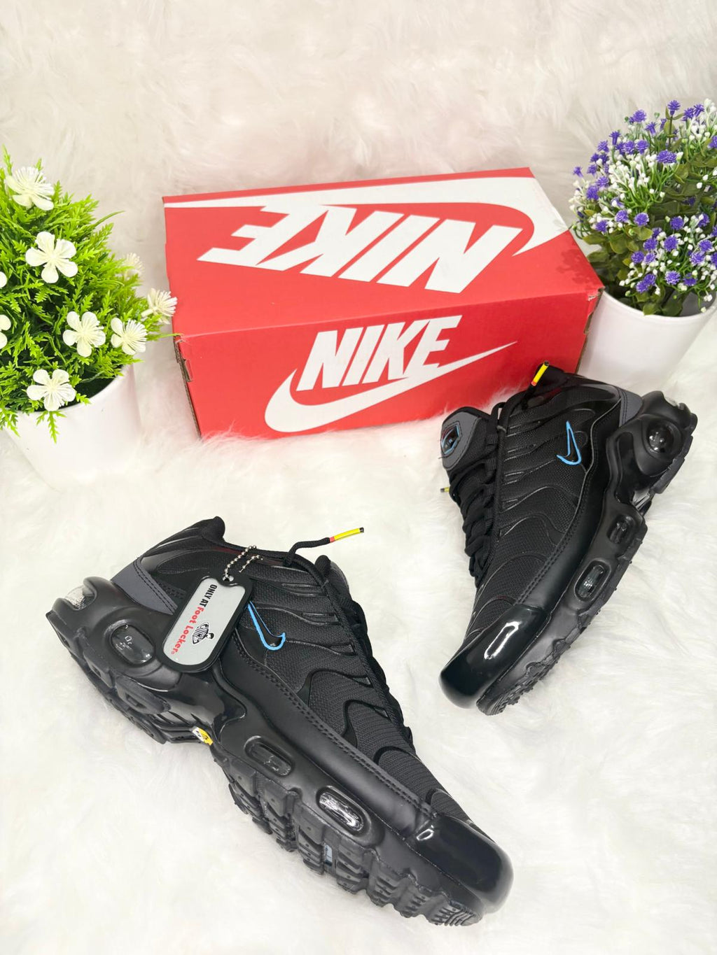 Nike Air Max Plus Black: Classic TN Sneakers with Tuned Air Comfort